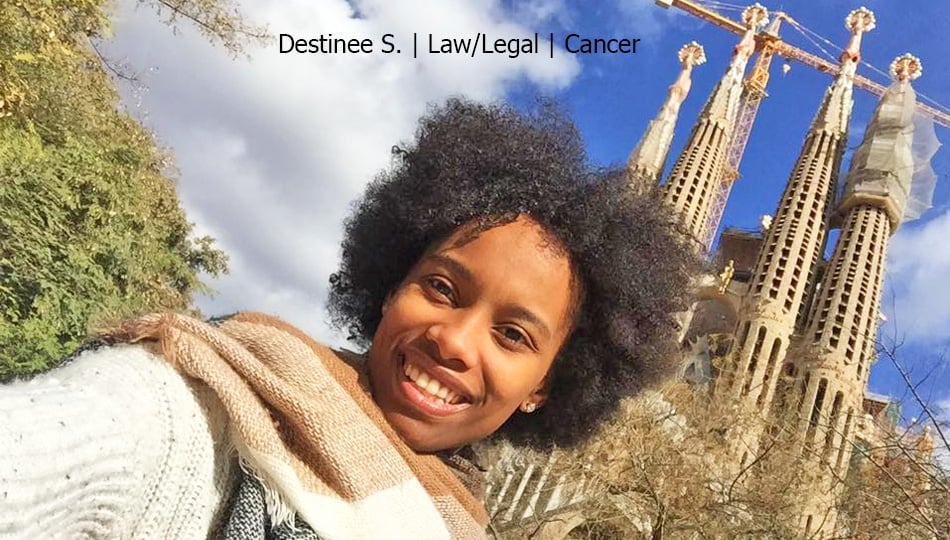 Barcelona intern smiling in front of the Sagrada Familia