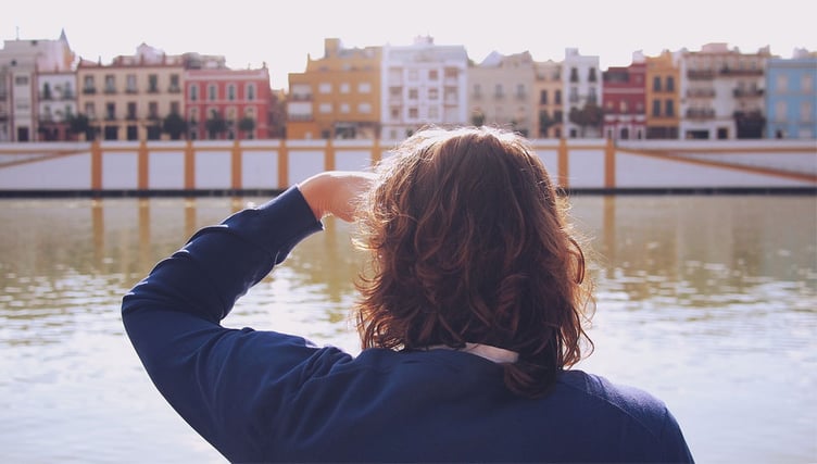 Girl looking out across the water