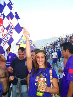 Florence intern cheering at soccer game