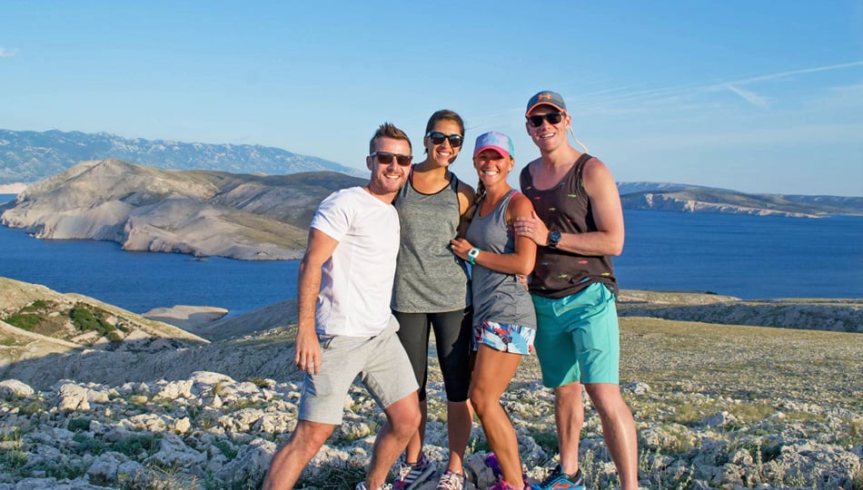 Group of travelers exploring in Baska