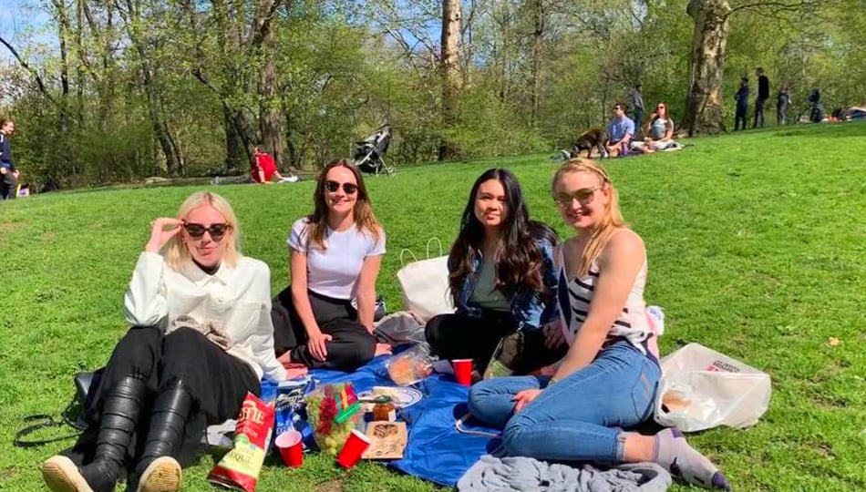 Lindsey having a picnic with friends in New York