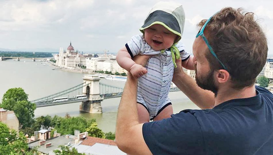 Man and his baby on a bridge