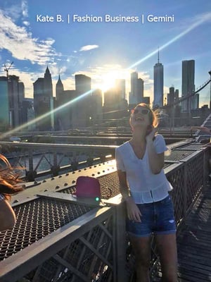 New York City intern laughing on the Brooklyn Bridge