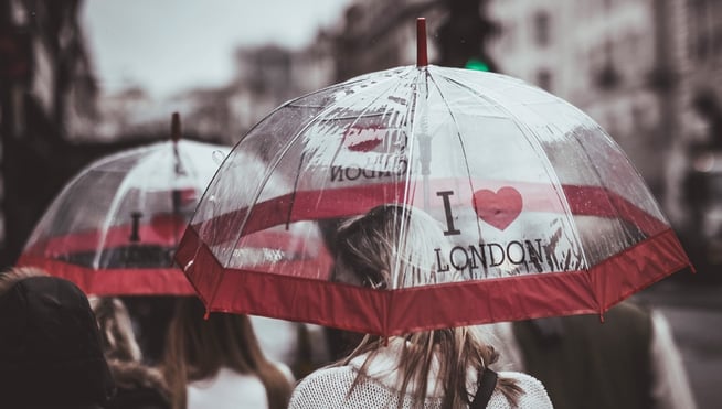 People walking in the rain with umbrellas
