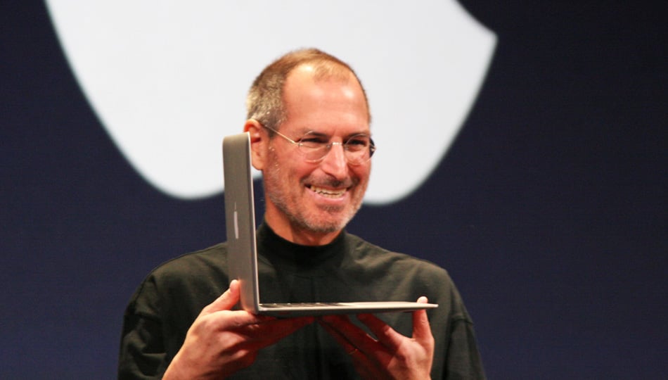 Steve Jobs presenting mac laptop