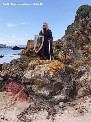 Woman Standing on a rock in Ballintoy Harbour