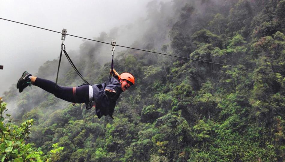 Woman-ziplining-through-the-Amazon-rainforest