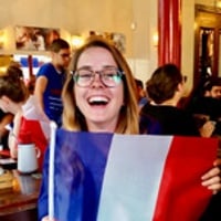 Claire holding up the French flag