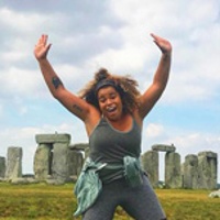 Mariah R. jumping in front of Stonehenge