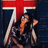 Stephanie C. in front of the Australian flag