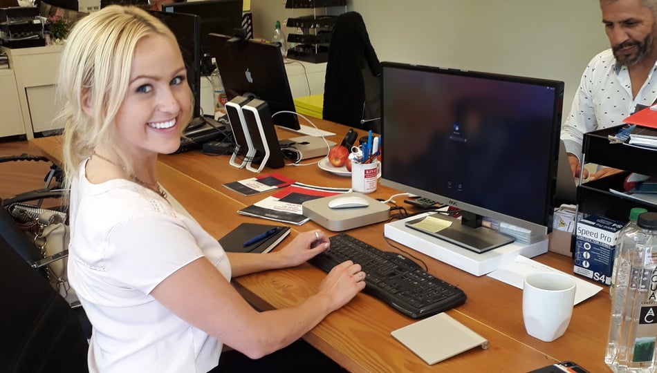 young woman working at computer