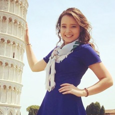 Milan Business intern at the leaning tower of Pisa